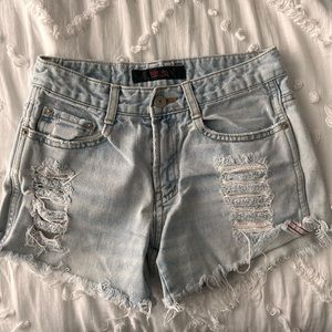 Distressed denim jeans